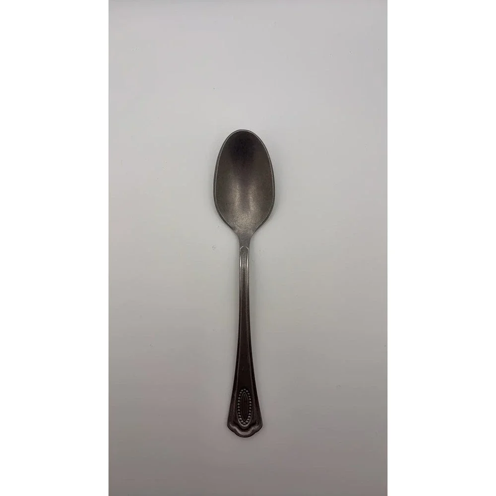Vintage Silver-Plated Spoon with Beaded Oval Design